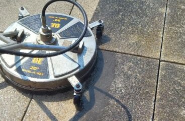 Flat Surface Cleaner in action on concrete