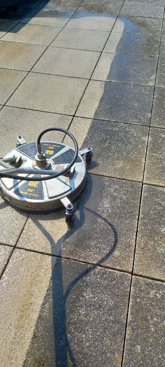 Flat Surface Cleaner in action on concrete